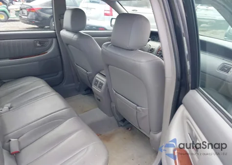 2003 Toyota Avalon Xls z USA, uszkodzony, nr VIN 4T1BF28B83U289548